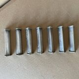 Set of 7 antique knife holders
