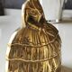Ancienne cloche de table/ou Décoration en bronze à patine Dorée. Femme victorienne en robe crinoline