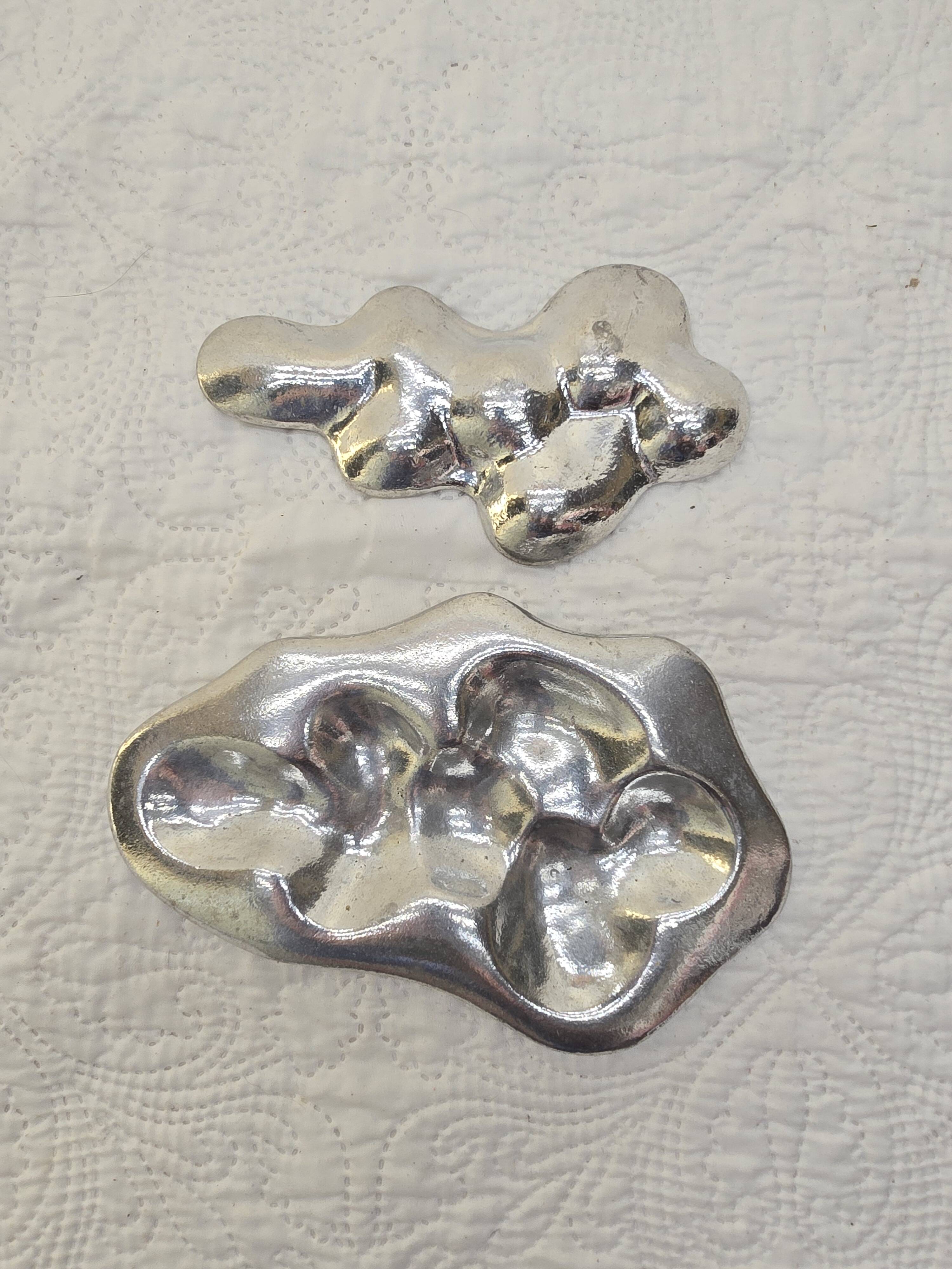 Aluminum sculpture by Paul Oudet for Claude de Muzac