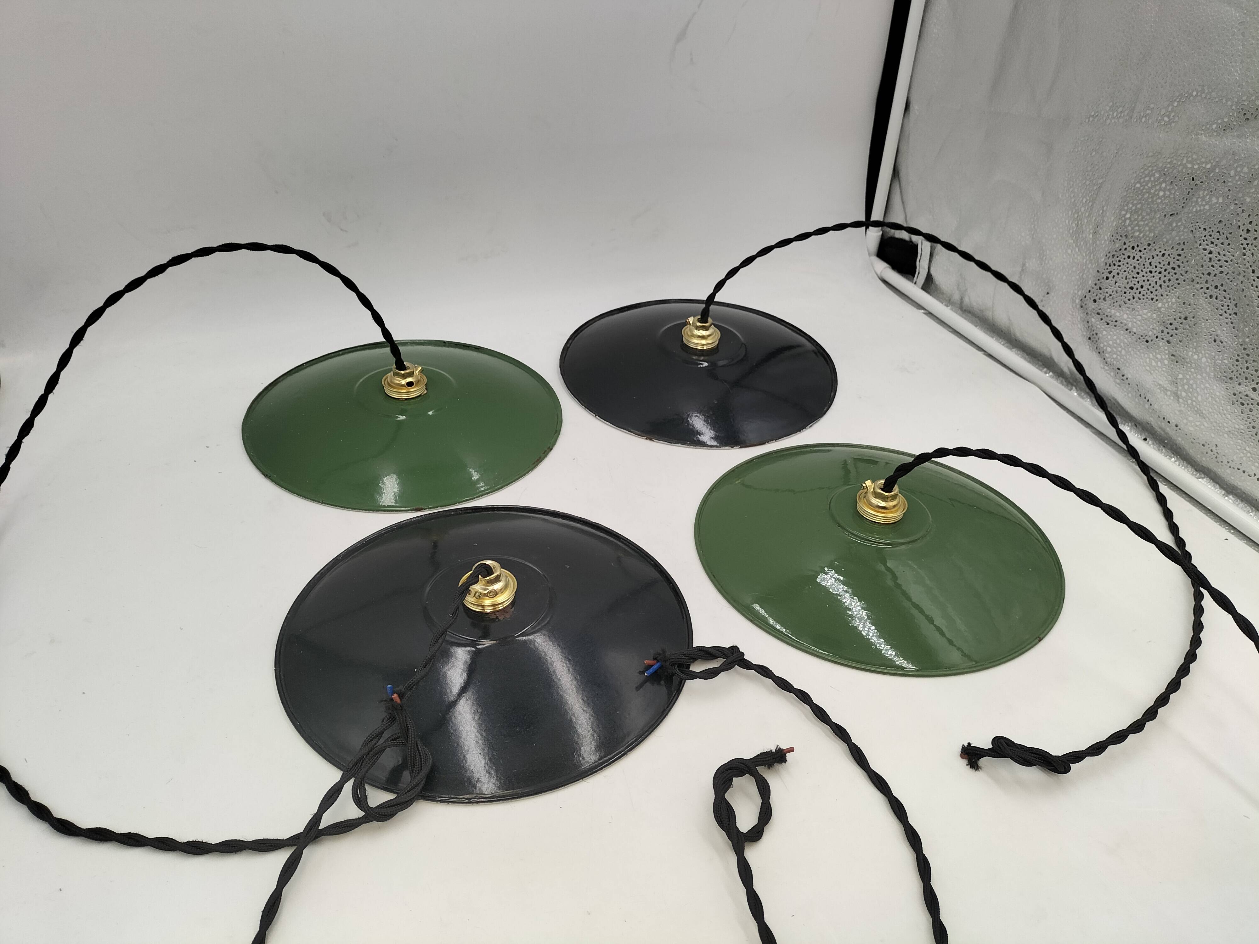 4 enameled sheet metal pendants