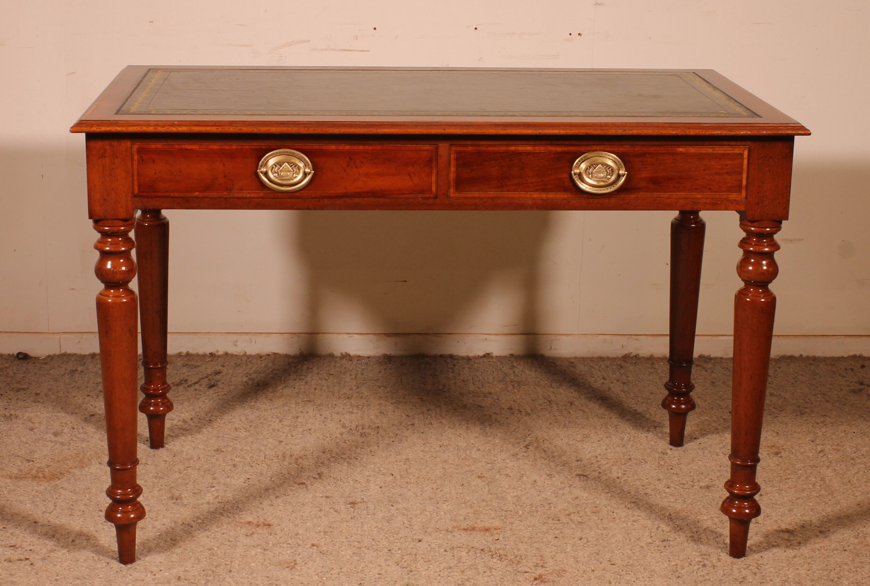 flat desk with two drawers from the 19th century in mahogany and inlays