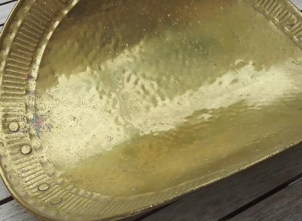 Old brass log holder