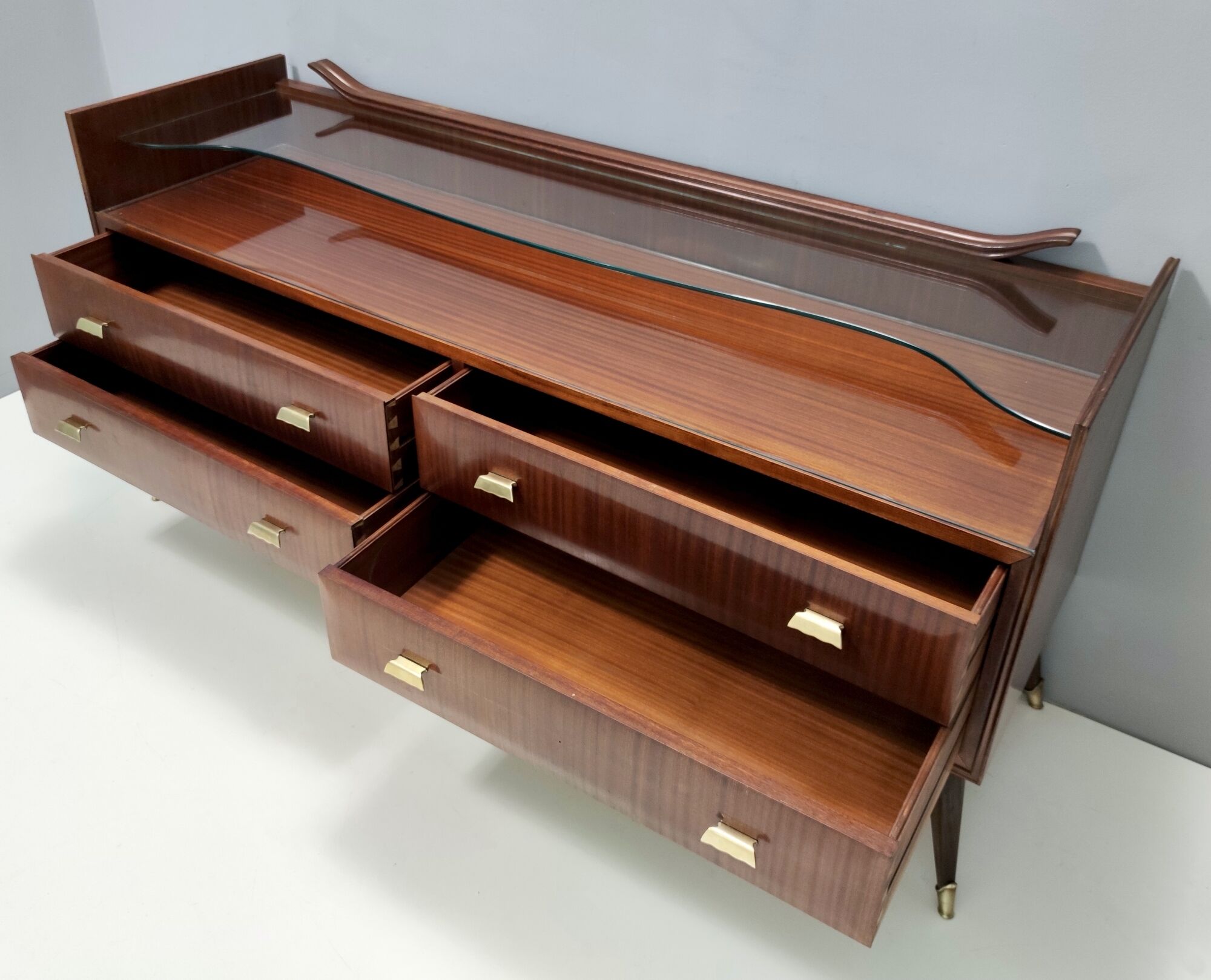 Walnut dresser with a thick glass top, italy