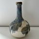 Cherry-decorated earthenware carafe