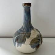 Cherry-decorated earthenware carafe