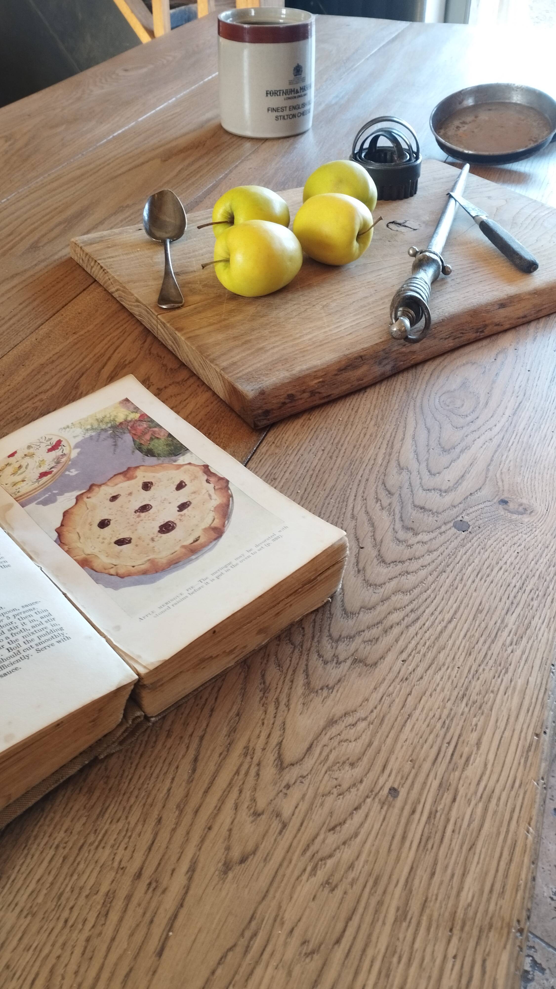 Solid oak farmhouse table with central drawer and extension