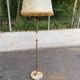 Vintage brass onyx floor lamp with fringed shade.