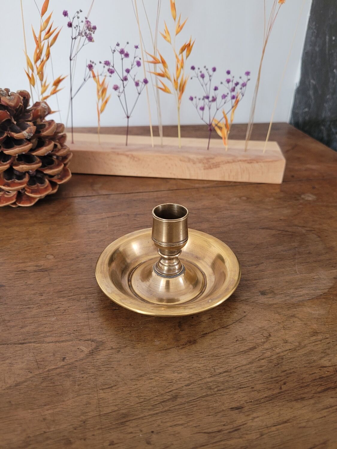 Round brass candlestick