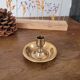 Round brass candlestick