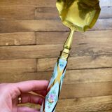 Ladle with earthenware reed