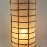 Lamp to be laid in rattan and fabric