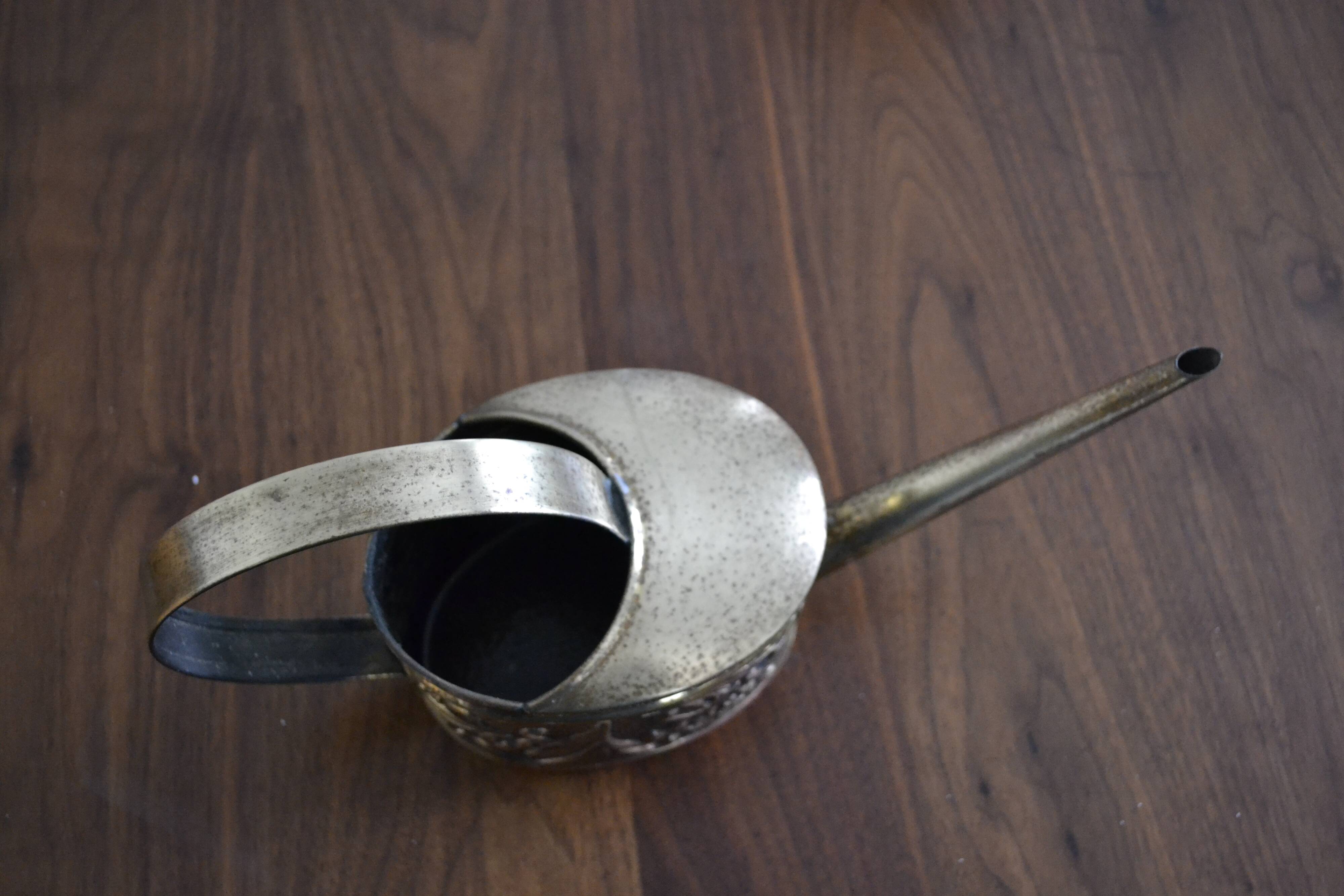 Brass watering can