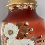 Pair of antique vases with butterfly and flower motif.