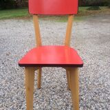 Eight wooden and formica chairs