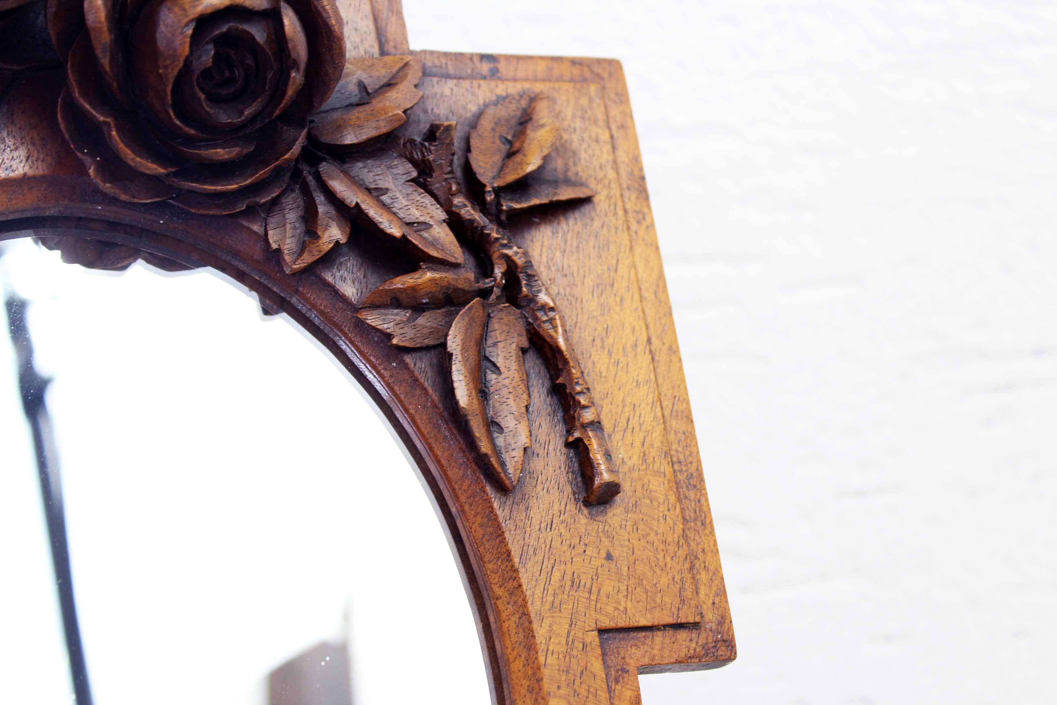 Ancient carved walnut frame mirror