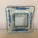 Blue glass paste pocket emptier