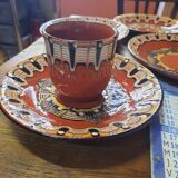 Set of etnic ceramic cups and plates