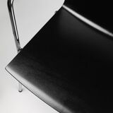 Mid-century modern black design chair in with armrests, Belgium
