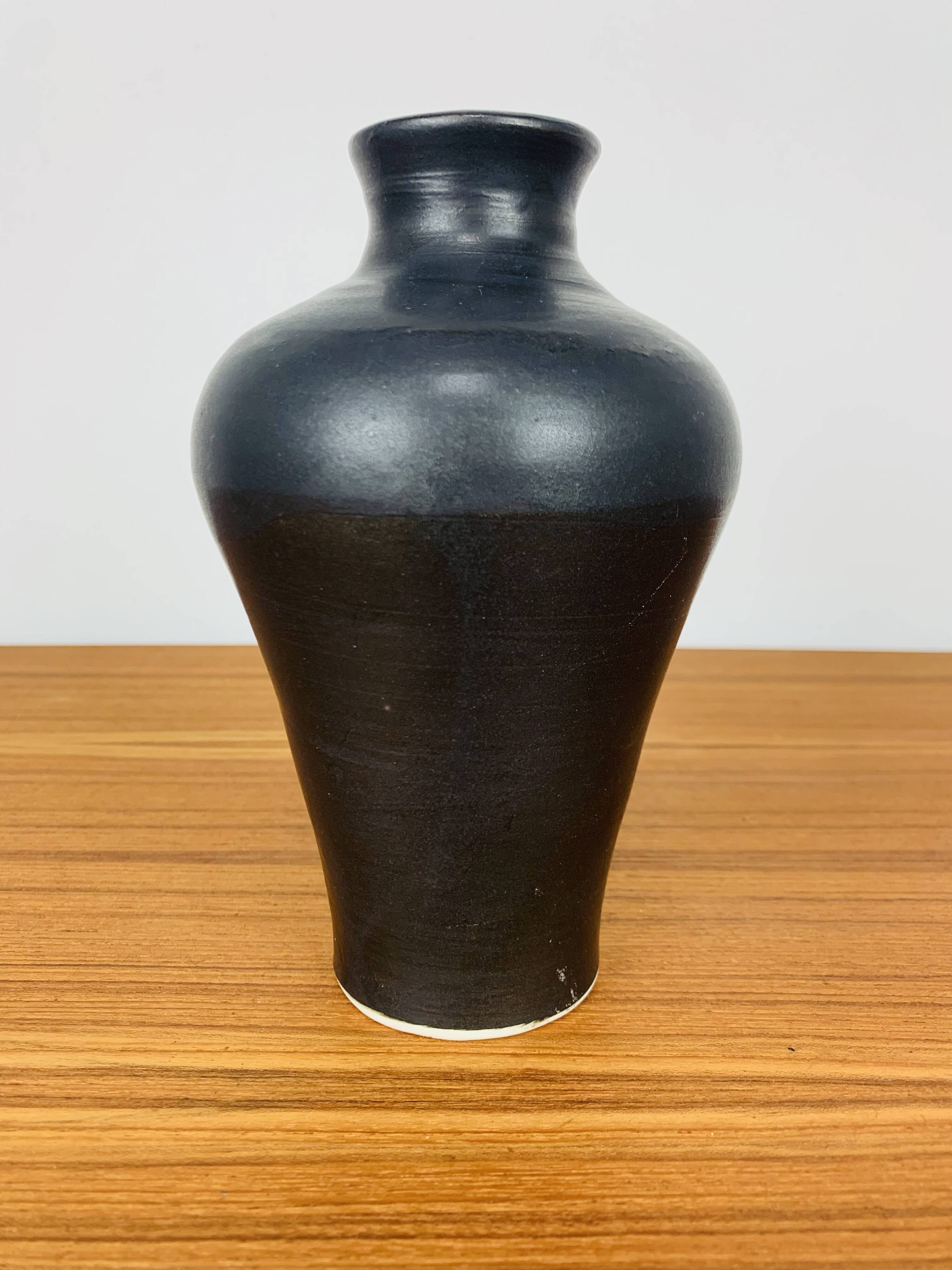 Vintage black ceramic vase