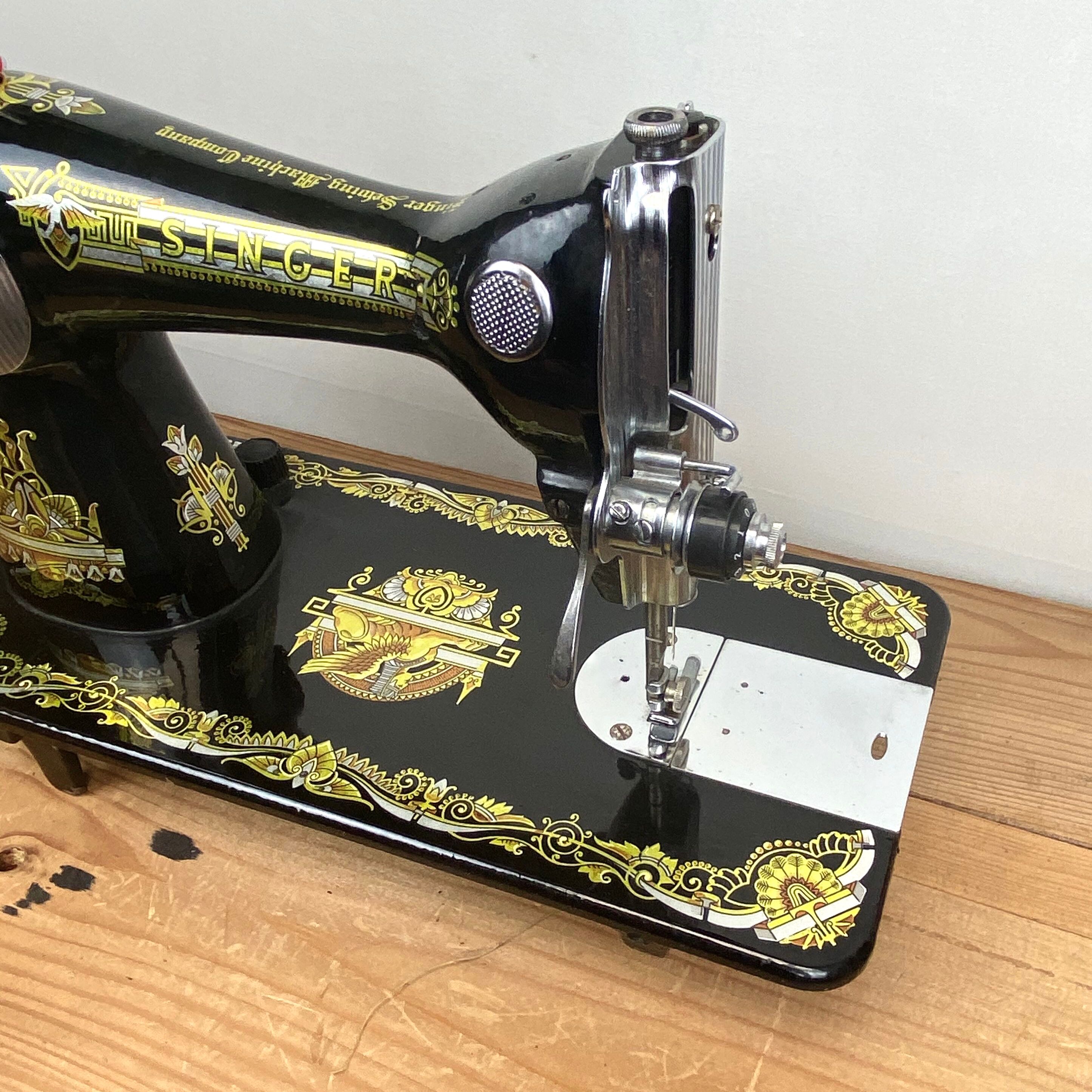 Singer - old sewing machine very decorative and functional