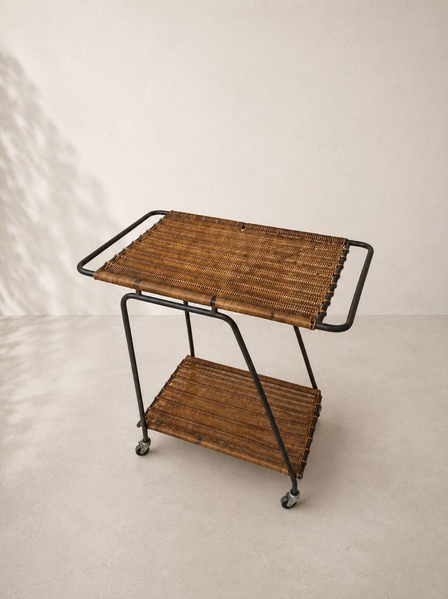 Vintage rolling dessert trolley in rattan and black metal – 1950s/60s