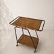 Vintage rolling dessert trolley in rattan and black metal – 1950s/60s