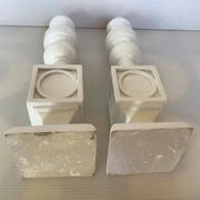Pair of white resin candle holders
