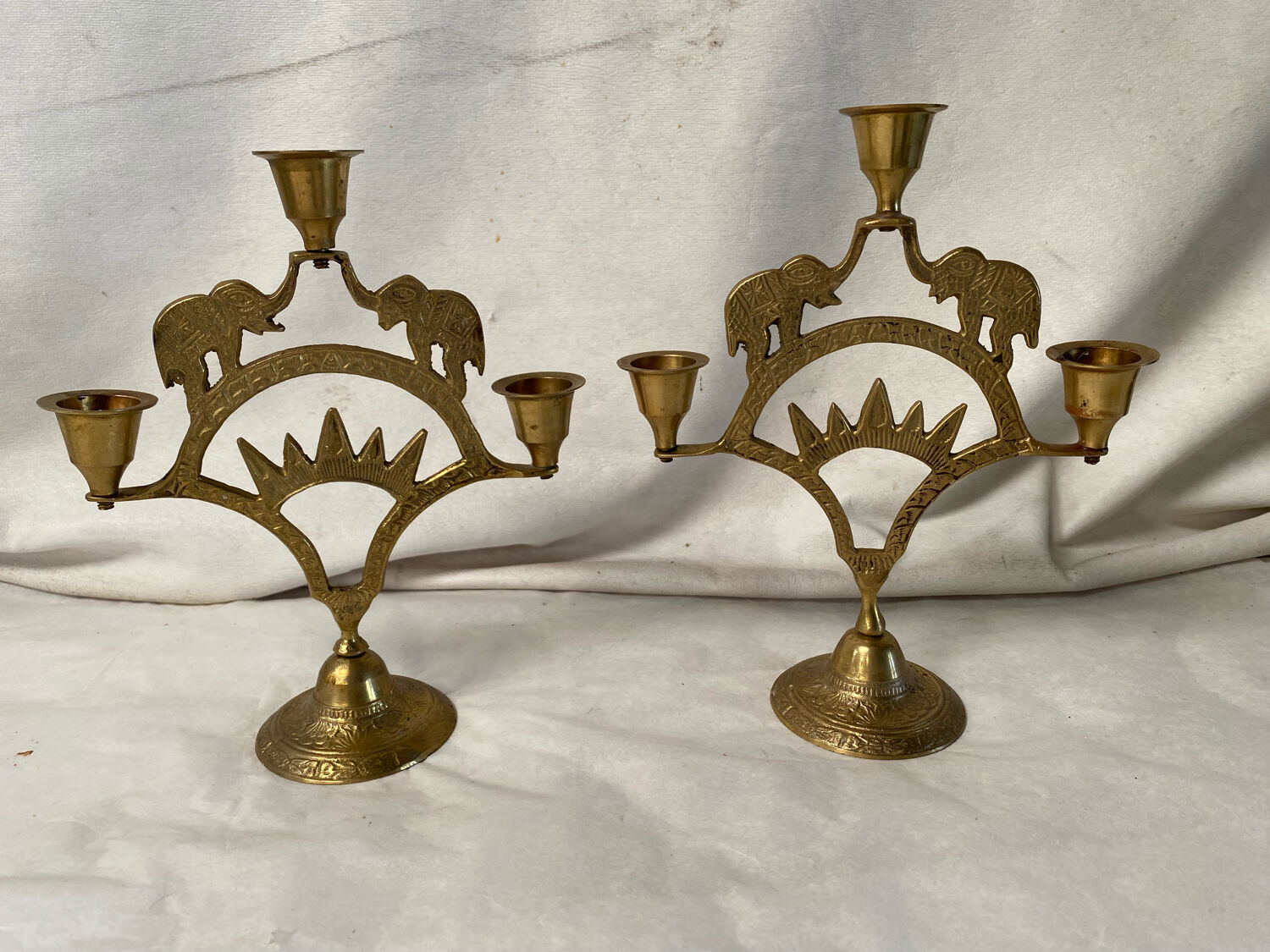 Pair of brass elephant candlesticks