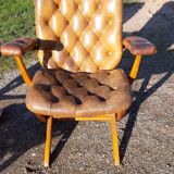 Paire de fauteuils cuir de style chesterfield