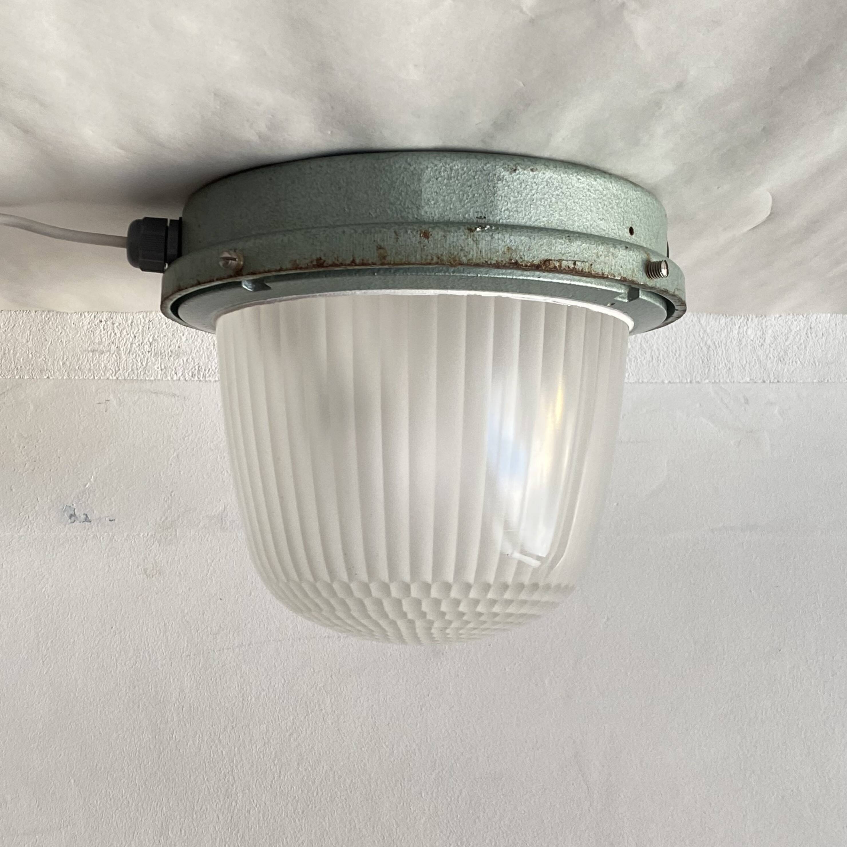 Large porthole wall light Holophane CE 200 glass and cast iron