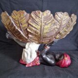 Centerpiece (empty pocket) in resin with African character