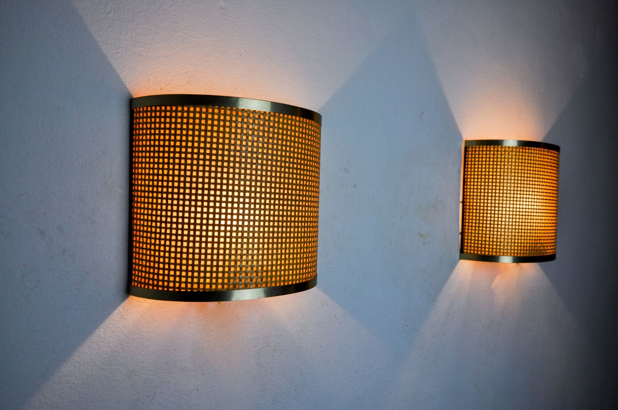 Pair of rattan and brass appliques, Italy, 1960