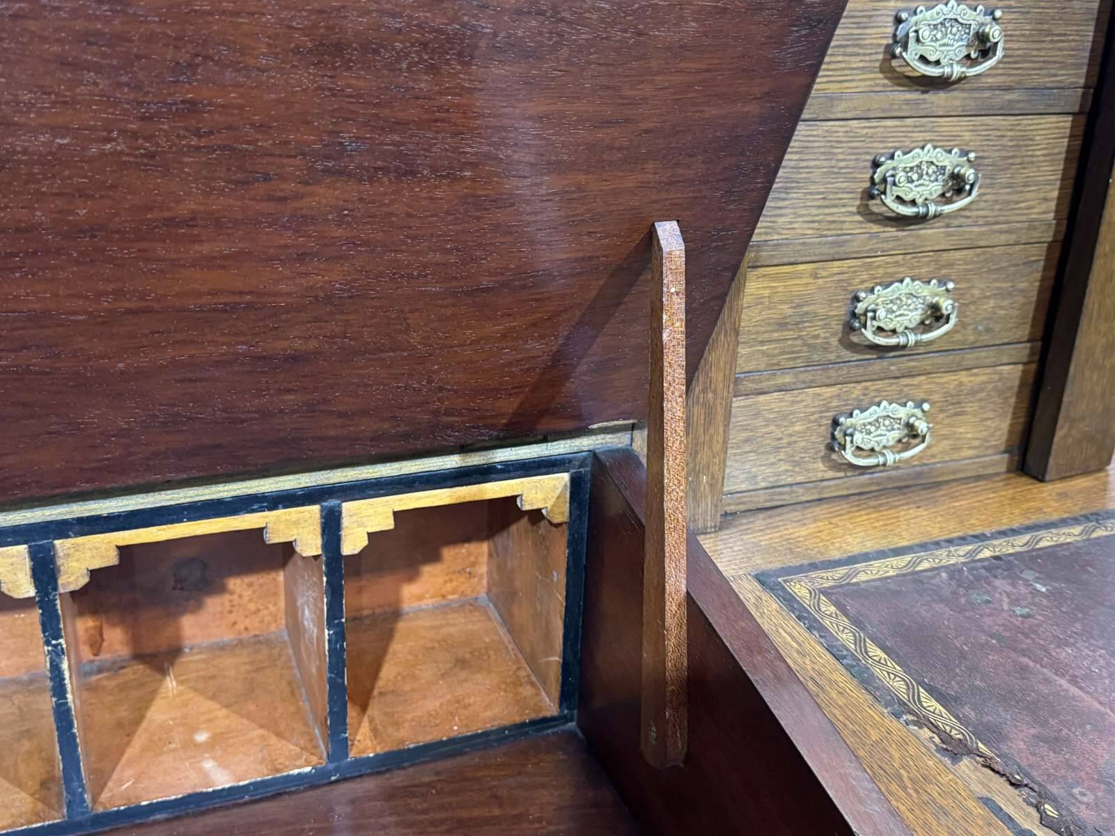English oak graduated desk from the late 19th century.