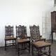 Set of 6 Henri II chairs in carved openwork oak with caned seats.