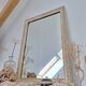 Miroir rectangle en bois et sculpté en bas-reliefs