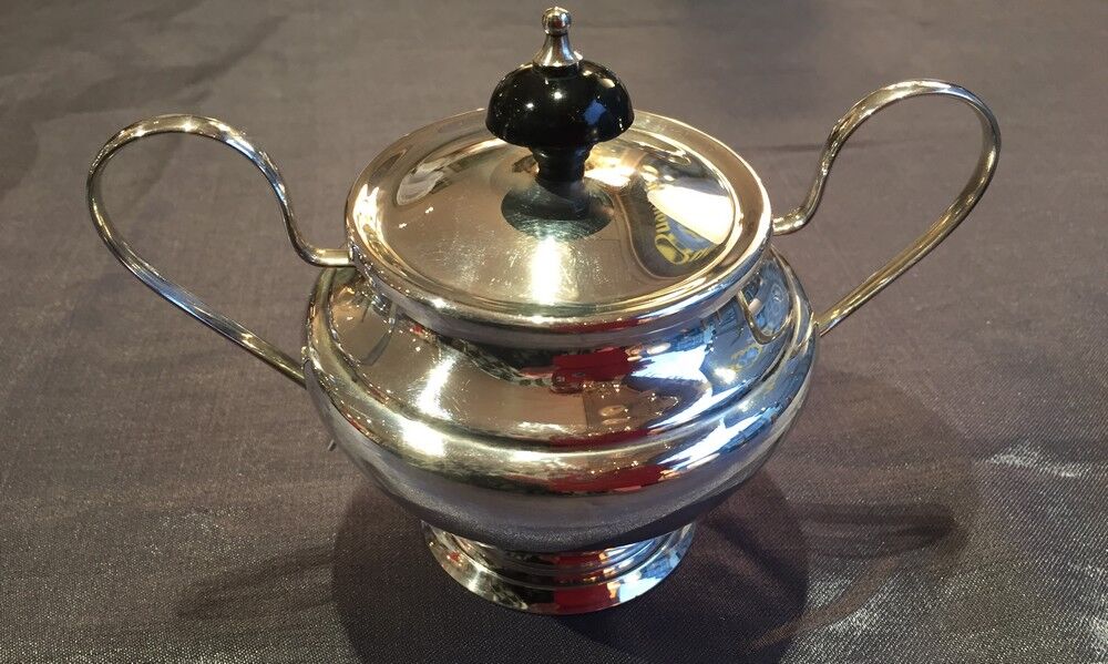 Coffee and the service in silver metal flagship