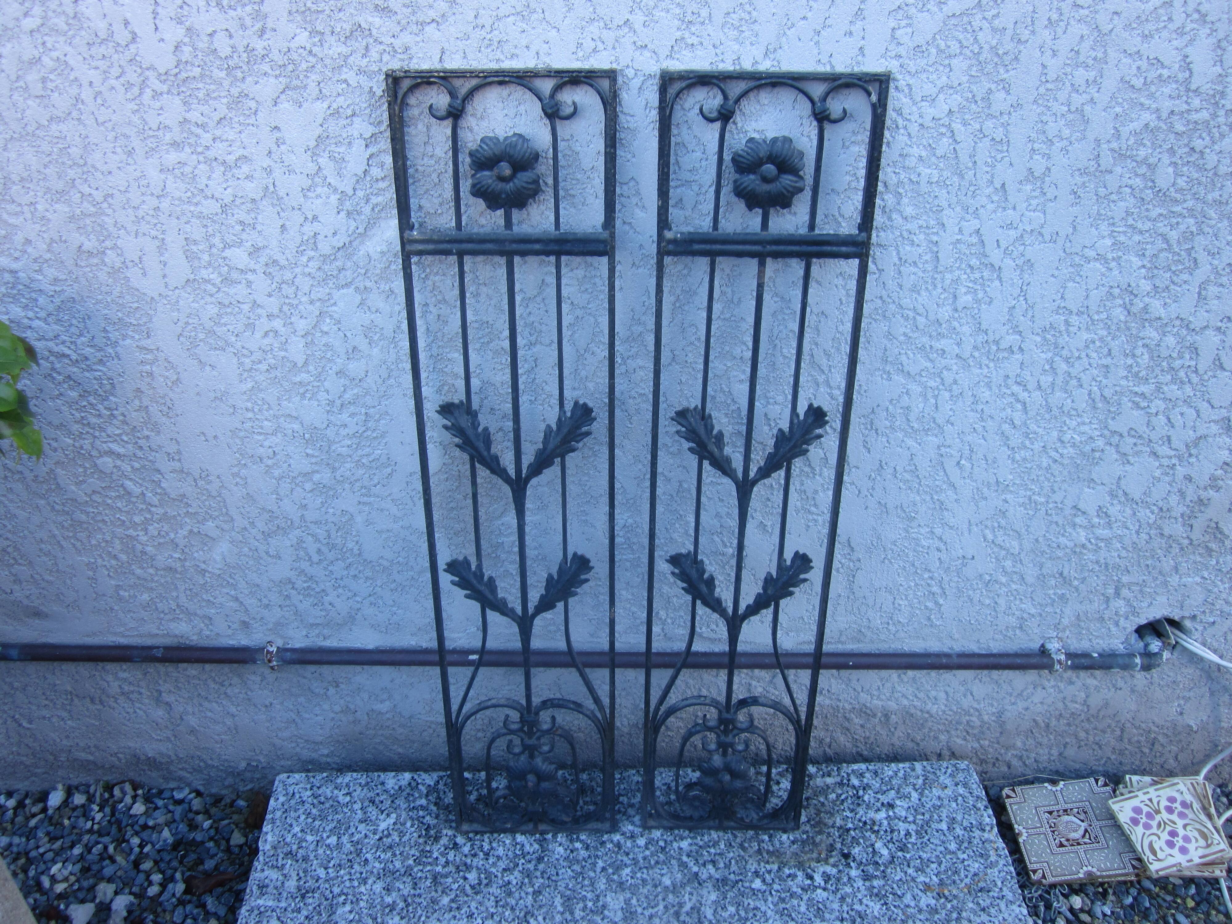 Pair of old wrought iron grid