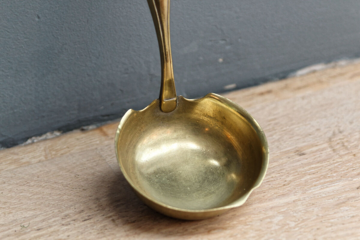 Filled silver cream ladle