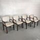4 wooden and fabric chairs