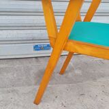 Light wood bridge armchair