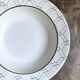 Small round hollow dish by Christian Dior in Italian earthenware