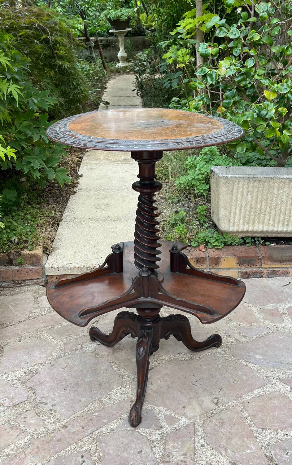 Old pedestal table with rotating trays