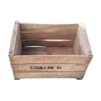 Wooden box with black letters