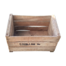 Wooden box with black letters