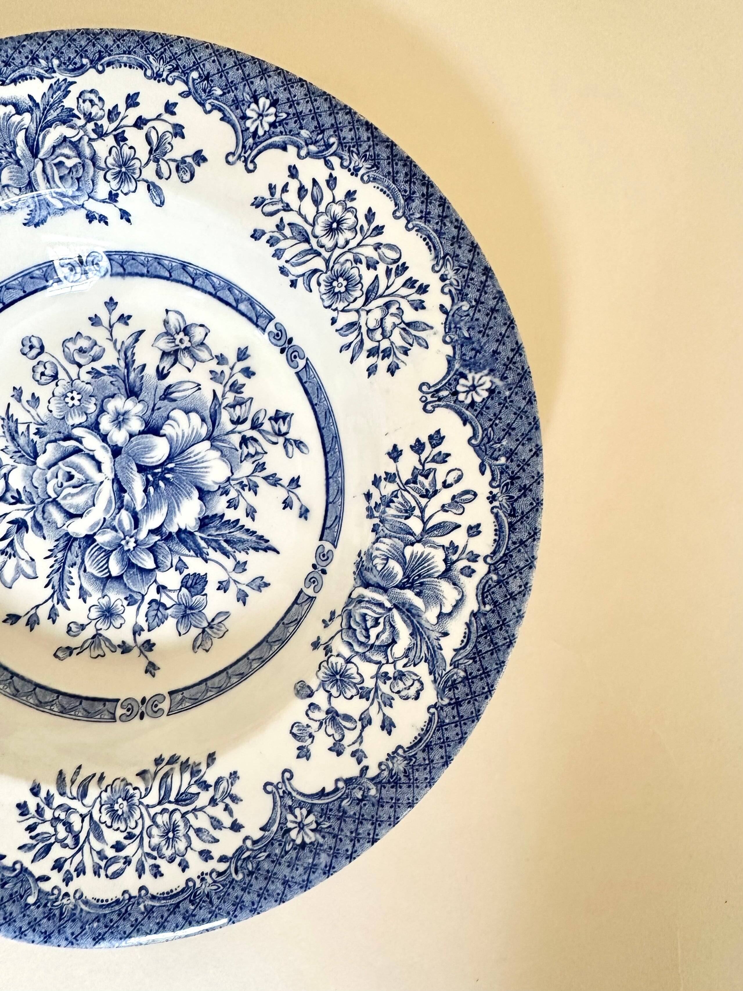 Set of six English deep plates, made of ironstone ceramic, floral patterns.