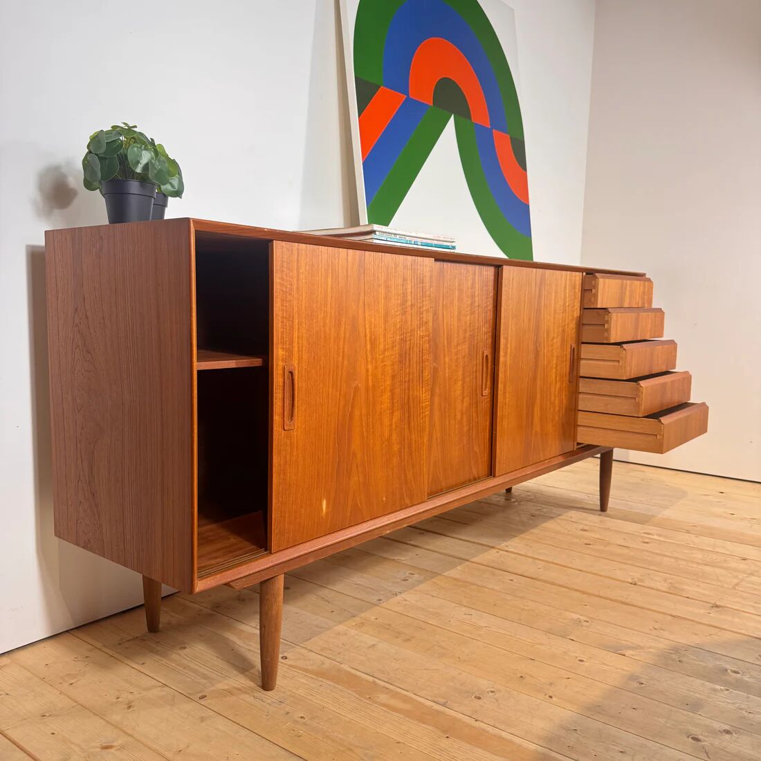 Danish teak sideboard with sliding doors and drawers, 1960s.