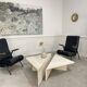 Duo de fauteuils vintage en simili-cuir noir