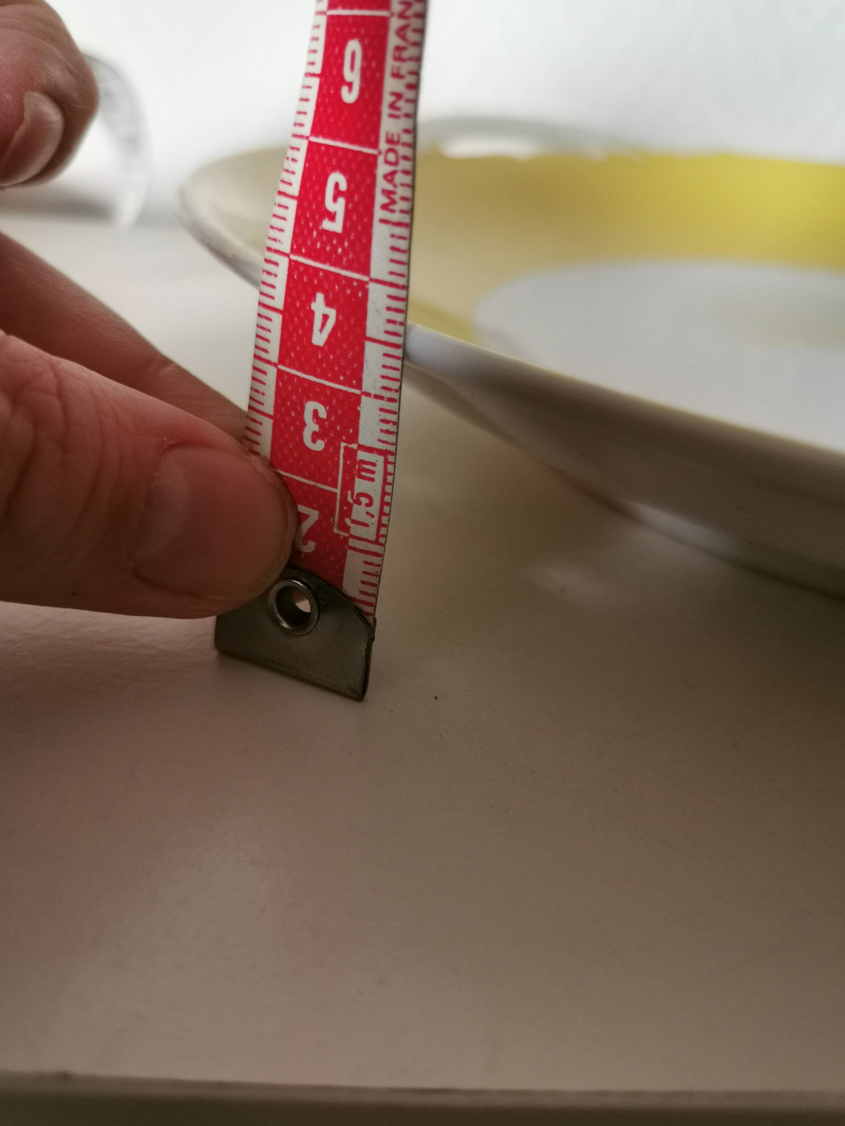 round yellow and white Limoges porcelain serving dish