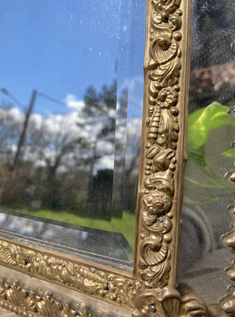 Golden mirror with 19th century embossed brass beads