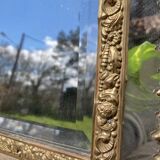 Golden mirror with 19th century embossed brass beads